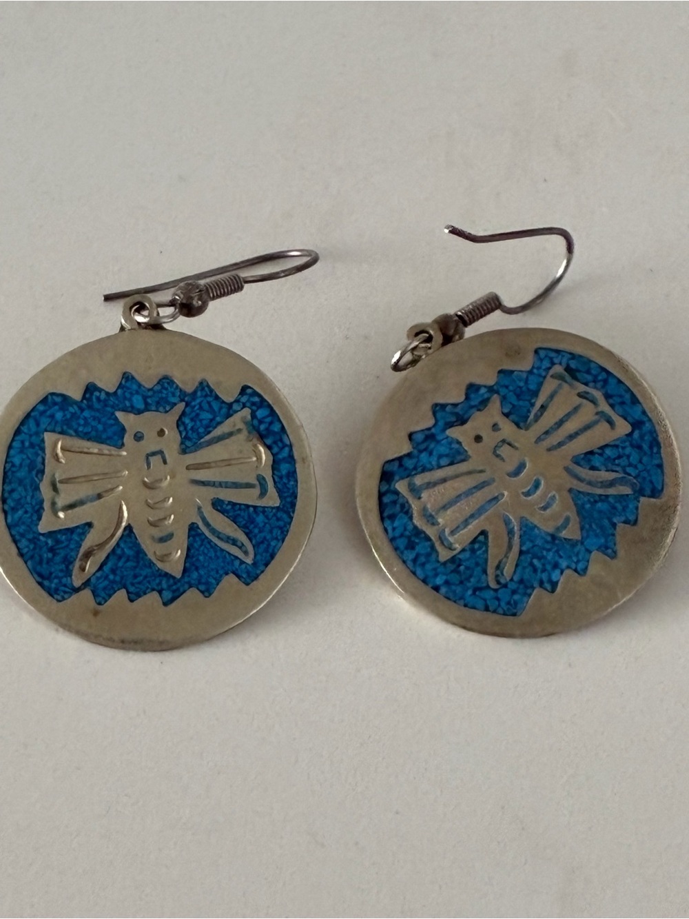Vintage Alpaca Mexican earrings featuring a turquoise chip inlay mosaic.